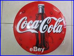 A VINTAGE 24 ROUND PLASTIC MADE, 3D COCA COLA SIGN, WITH NEON INSIDE, 90's. OR 358 A VINTAGE 24 ROUND PLASTIC MADE, 3D COCA COLA SIGN, WITH NEON INSIDE, 90's. OR 358