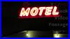 Vintage_Motel_Neon_Sign_At_Night_In_Red_Color_U0026_Old_Font_On_Building_Roof_Hd_Stock_Video_Footage_01_wj